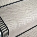 Close-up of Fibre Flooring Highclere Wool Herringbone Stair Runner texture.