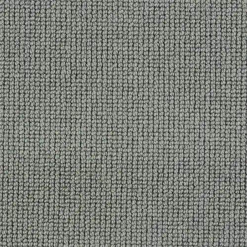 Close-up texture of cool grey loop pile carpet in a grid pattern.