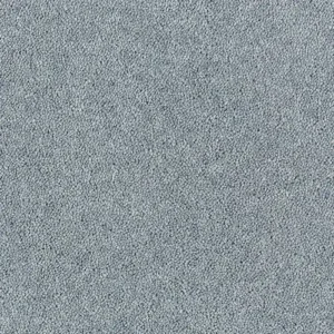 Close-up texture of soft steel blue cut pile carpet surface.