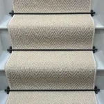 Harrison Cream Herringbone Stair Runner on a staircase.