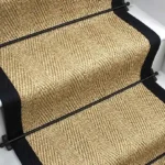 Honey Herringbone Sisal Stair Runner on stairs.