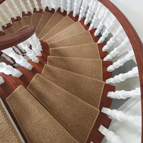 Sisal carpet stair treads on a hotel spiral staircase