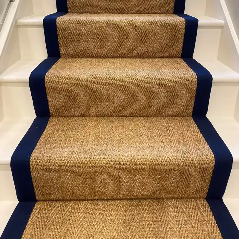 Natural sisal stair runner with dark blue border