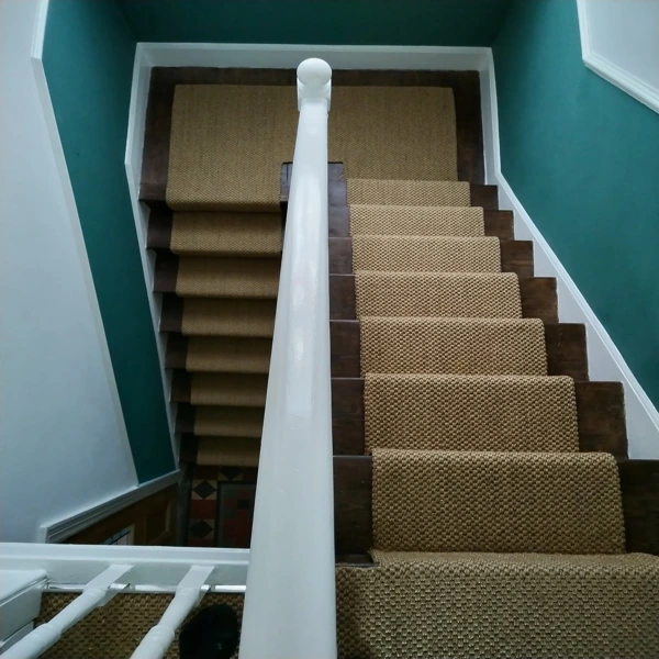 Sisal carpet stair runner in a modern office building
