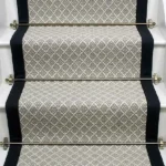 Park Lane wool flatweave stair runner with black edging and brass stair rods. (1)