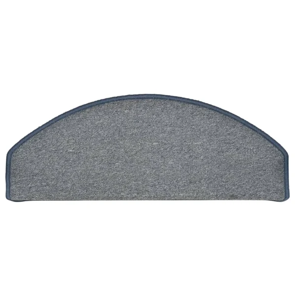Semi-oval blue-grey carpet stair tread with bound edges.