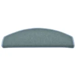 Semi-oval blue-grey carpet stair tread with rounded edges and light blue stitched trim.