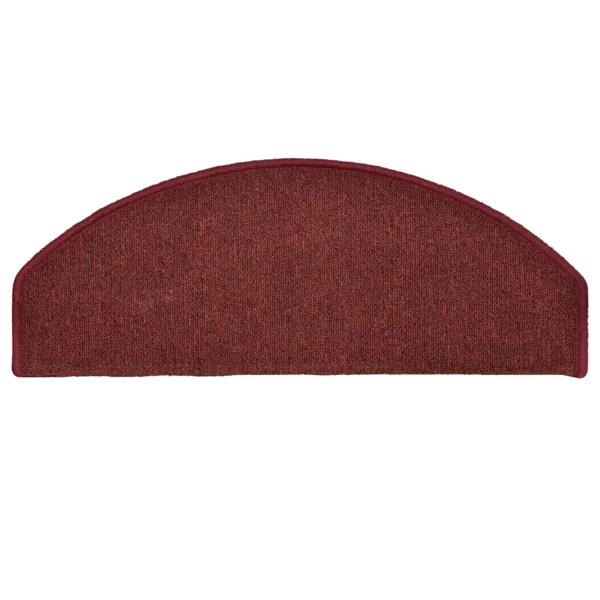 Semi-oval burgundy red carpet stair tread with bound edges.