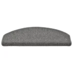 Semi-oval charcoal grey carpet stair tread with a bullnose front edge and stitched borders.