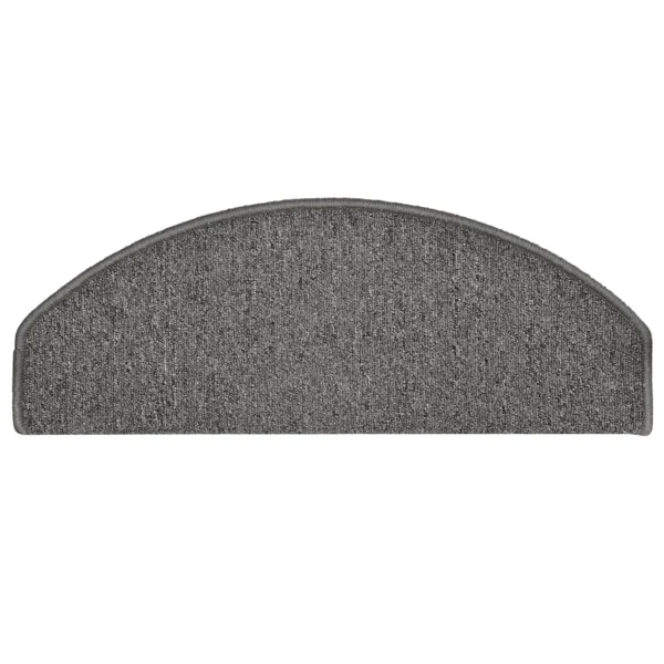 Semi-oval charcoal grey carpet stair tread with bound edges.