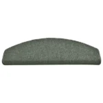 Semi-oval dark green carpet stair tread with a bullnose front edge and stitched borders.