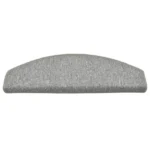 Semi-oval light grey carpet stair tread with a bullnose front edge and stitched borders.