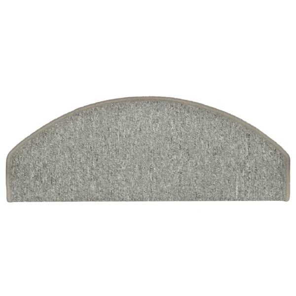 Semi-oval light grey carpet stair tread with bound edges.