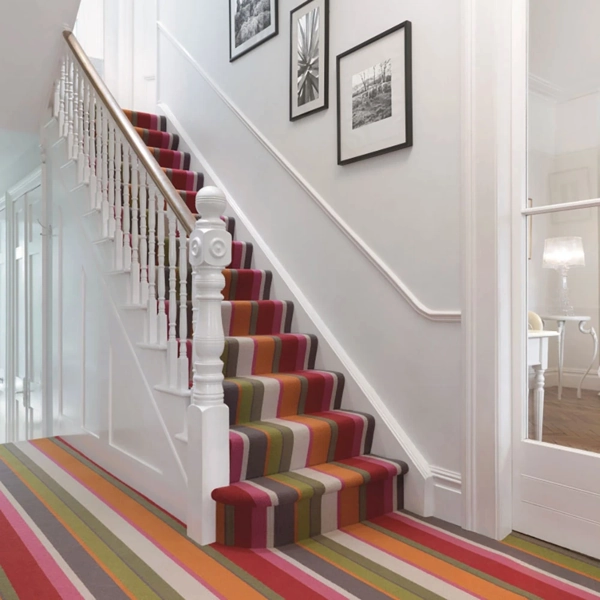 Staircase-with-multicolored-striped-carpet-runner