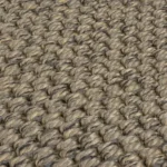 Thick textured taupe loop stair carpet.